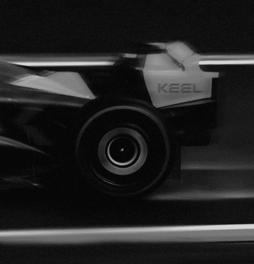 KEEL race car at speed, motion blur